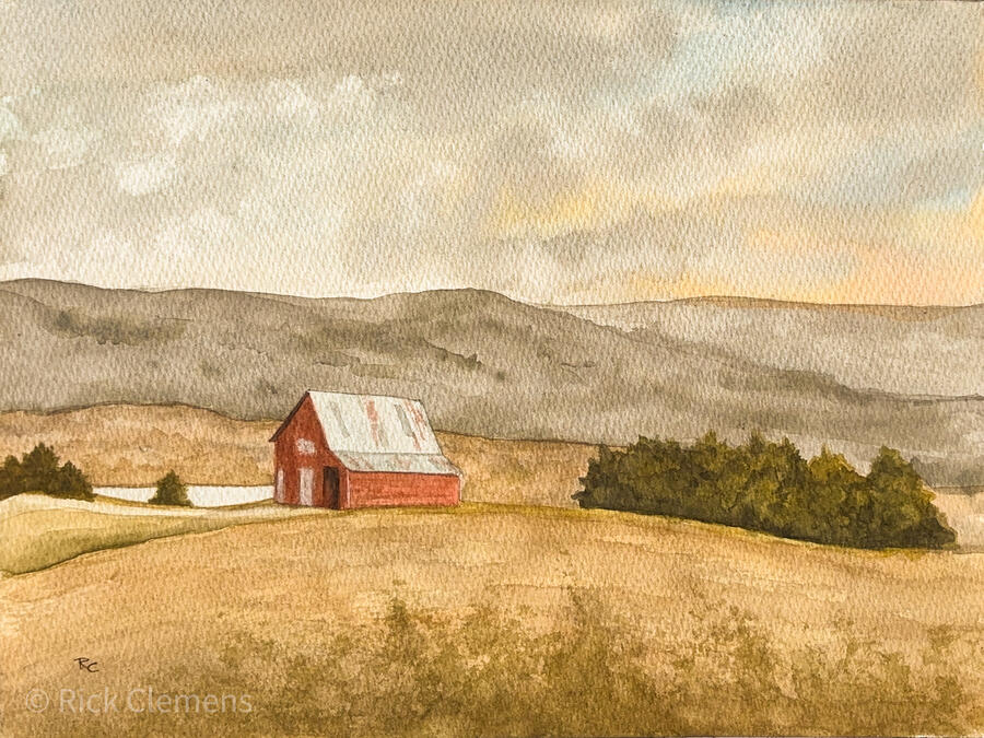 "Red Barn Near Linden Lure" – original watercolor landscape painting of a red barn with a tin roof in an open golden field with misty mountain ridges in the distance, by Rick Clemens